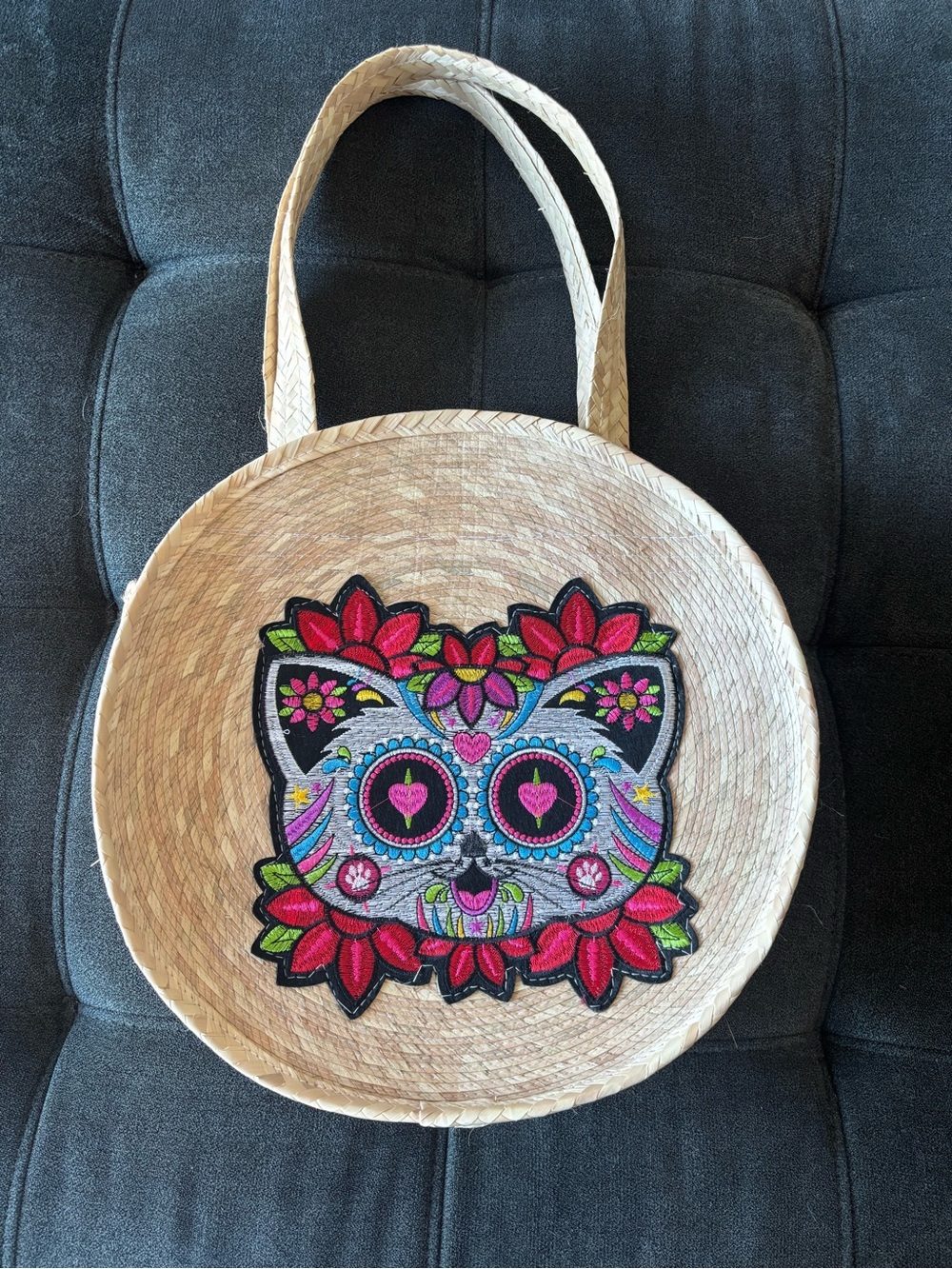 Handwoven Round Straw Tote with Colorful Embroidered Cat